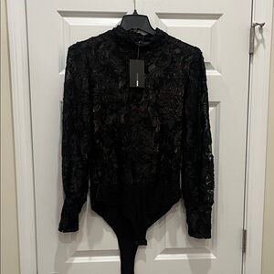 Fashion Nova most praised mesh bodysuit